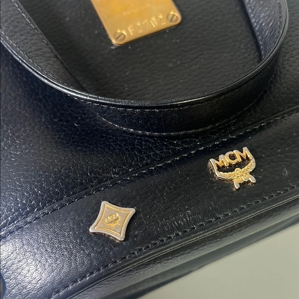 MCM Black Mini Tote with Gold Accents and Trapezoid Shape